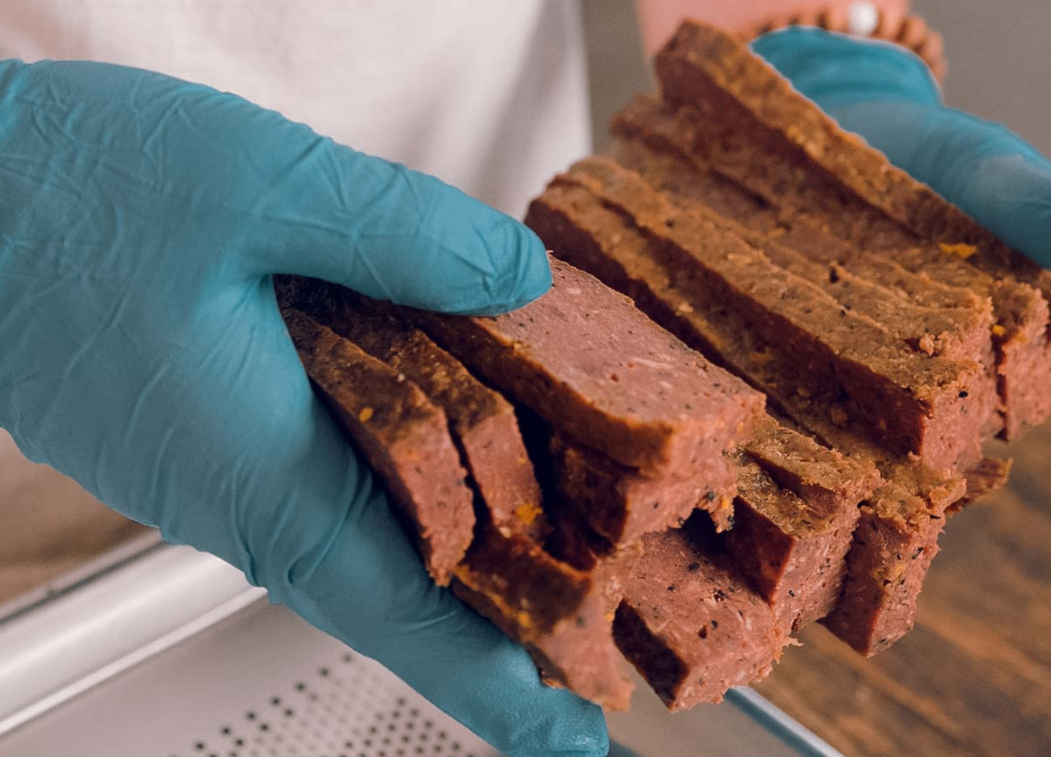 Freshly sliced treats held by the kitchen team